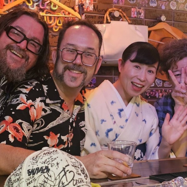 4 friends at a bar